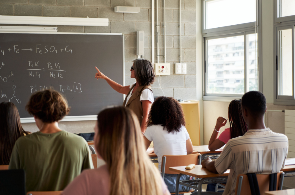 college image 2 Teacher pointing at the blackboard