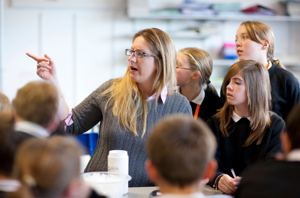independent school image Teacher pointing at the board
